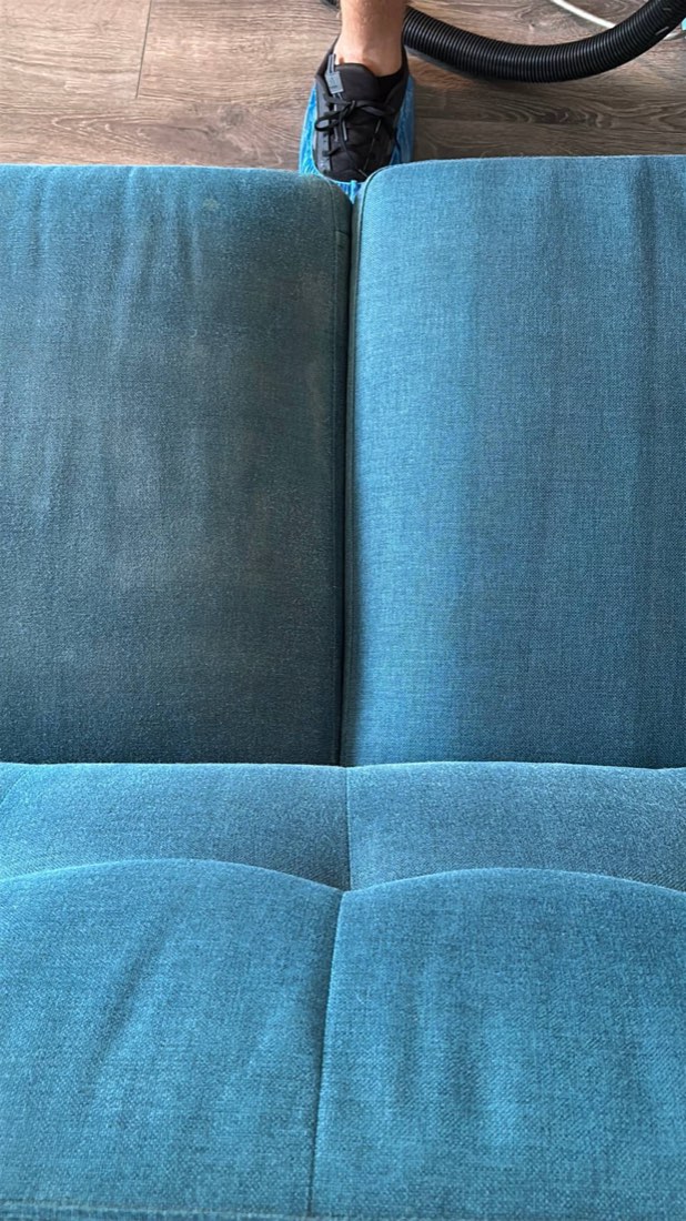 Teal sofa: cleaned cushion beside an uncleaned one